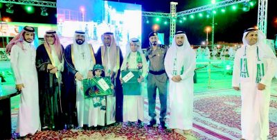 أهالي محافظة العقيق يحتفلون بمناسبة اليوم الوطني الـ 89