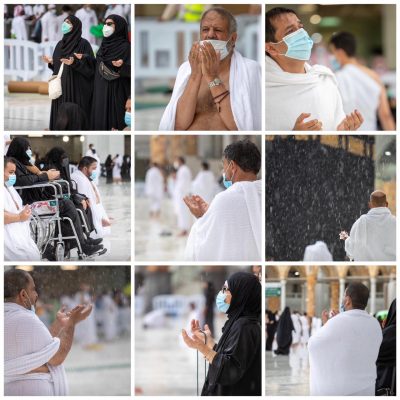 زوار وقاصدي المسجد الحرام لحظات هطول الأمطار